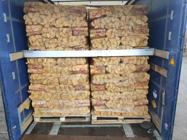 Firewood in mesh and polyethylene bags or cardboard boxes. Alder and Birch wood types.